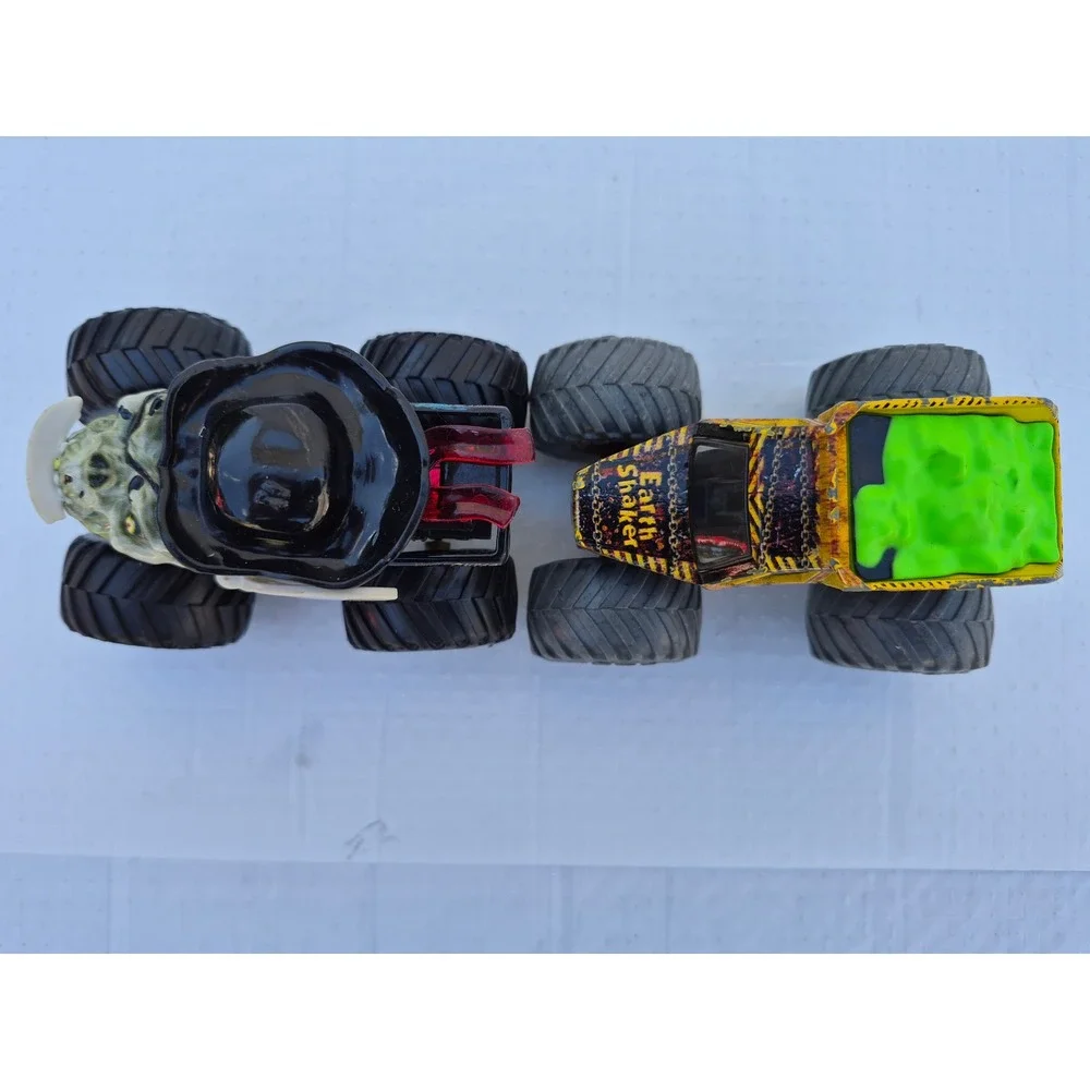 Monster Jam Pirates Curse and Zombie vs Hunter Earth Shaker Die-Cast Truck Lot